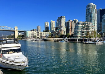 Granville Island peninsula and shopping district in Fairview district of Vancouver BC across False Creek from downtown Vancouver under southern end of the Granville Street Bridge 09.2022 Canada