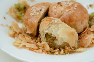 Indonesian local oven baked bread stuffed with green beans, with a crispy layered skin texture