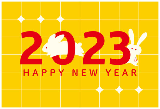 2023年年賀状テンプレート　卯年　白うさぎのイラストと年号のグラフィックデザイン　金色