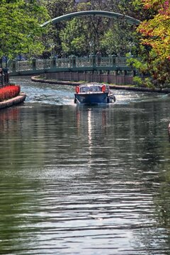 Touristic boat on the Porsuk river in Eskisehir, Turkey, vertical