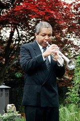 African american male trumpet player.