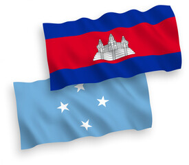 Fototapeta premium National vector fabric wave flags of Federated States of Micronesia and Kingdom of Cambodia isolated on white background. 1 to 2 proportion.
