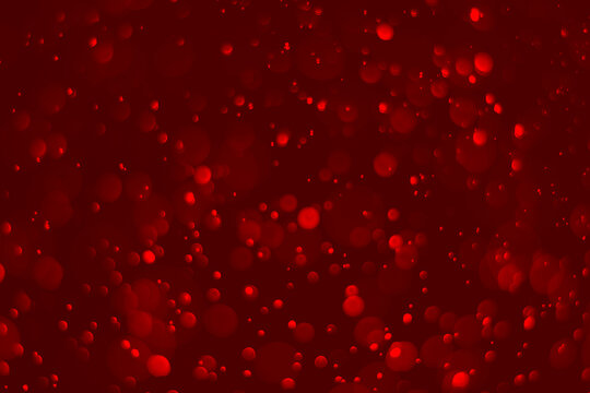 Red glitter vintage lights background.  red bokeh shiny on dark background.