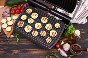 cooking at home on electric grill - zucchini and eggplant
