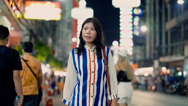 4K, Girls entrepreneur walking on street food in downtown urban city, Asian woman friends relationship get together to hang out night market enjoy snack tasty, beautiful girls, traveler concept

