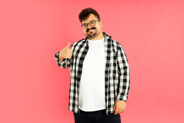 Concept of people, young fat man on pink background