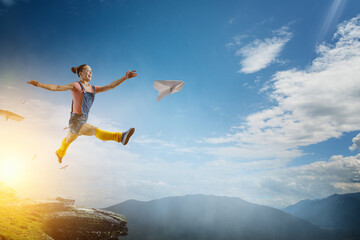 Young woman jumping in the air