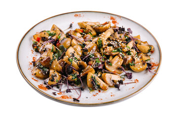Warm salad with fried mushrooms isolated