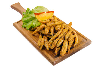 Crispy breaded european smelt fish on wooden
