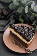 Chocolate, caramel, peanut cake, snickers on a plate