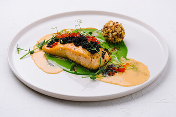 fried salmon with red and black caviar