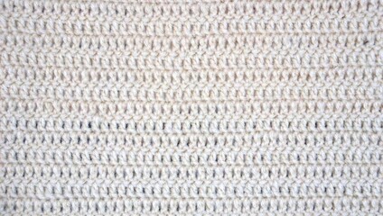 Handmade crochet knitted stitched yarn soft tender fiber fabric craft abstract wallpaper background backdrop