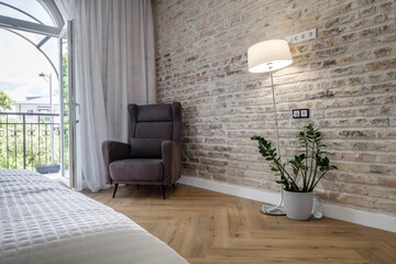 Interior of the modern luxure bedroom in studio apartments in light color style