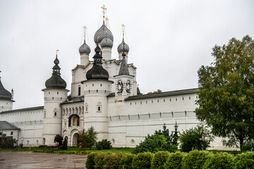 Fototapeta na wymiar fragments of the ancient Kremlin and the white stone cathedral of Rostov the Great