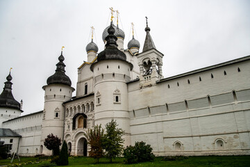 Fototapeta na wymiar fragments of the ancient Kremlin and the white stone cathedral of Rostov the Great