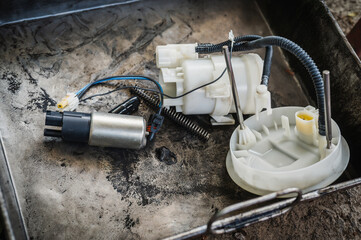 Obraz premium Close-up of automotive electric fuel pump and fuel pump module. 