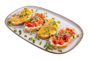 bruschetta with cream cheese and multi-colored grilled bell pepper