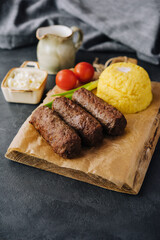 Traditional romanian grilled dish - mici or mititei - obrazy, fototapety, plakaty
