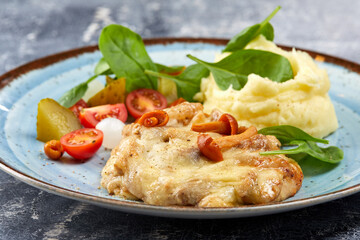 pork with mashed potato and vegetables
