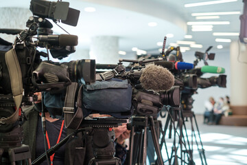 Cameras with microphones shooting interview