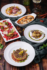 Carpaccio di manzo, Melanzane, Melanzana alla ricotta, Tar-tar with salmon and Vitello tonnato