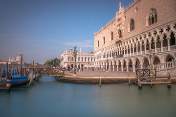 Fototapeta na wymiar Grand Canal at peaceful dramatic dawn and gondolas, Venice, Italy
