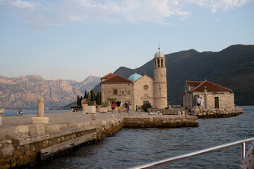 Fototapeta na wymiar Church of Our Lady of the Rocks. Islet of Perast in the Bay of Kotor, Montenegro