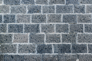 Light gray, white bricks on the wall decoration for background. Stone brick wall textures.