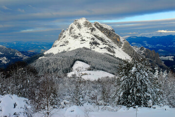 Snowy landscape with Mount Untzillatx (941 m). Urkiola Natural Park.