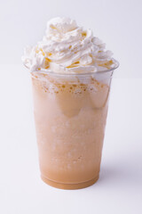 Chocolate milkshake with whipped cream on white