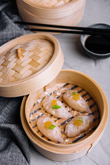 Steamed shrimp dumplings dim sum with pike caviar