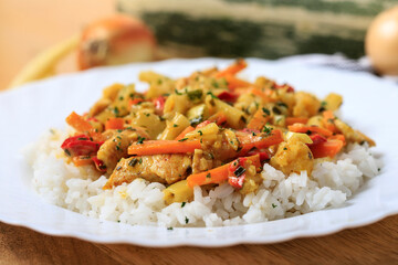 Fototapeta Chicken with vegetables and rice. obraz