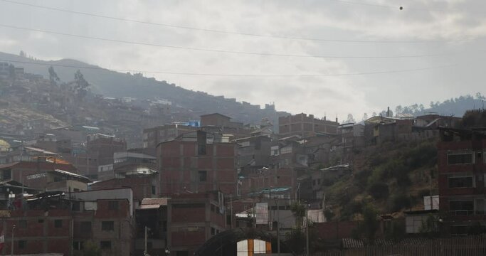 Cusco brick buildings on mountain 4k