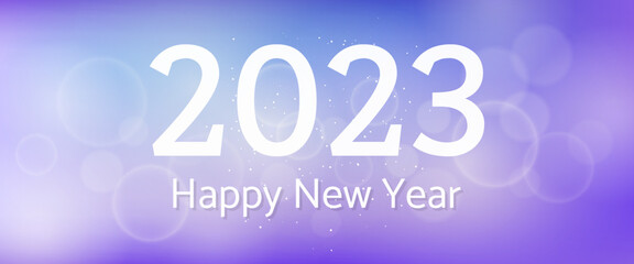 Happy new year 2023 incription on blurred background