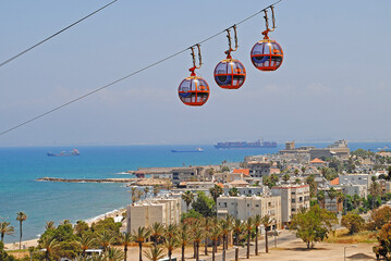 View of the Gondola (Cable car) with the cityscape of Haifa in the background in Haifa, Israel © Davslens Photography