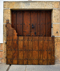 Revolving door called batipuerta. Calendar. Salamanca. Spain