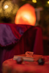 room decorated with esoteric elements such as energy stones, tarot cards and lucky dice