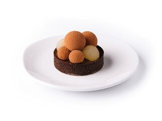 chocolate mini tart decorated with chocolate balls