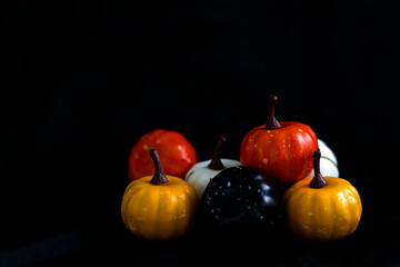 group of Halloween pumpkins on black background.