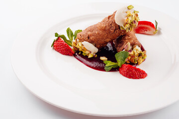 Cannoli italian cake with pistachios and strawberry jam