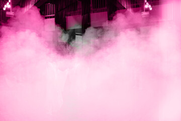 Fototapeta Defocus blurred dark pink neon abstract product stage spotlights and studio room with smoke float up the interior texture for display products wall background. Podium studios. obraz