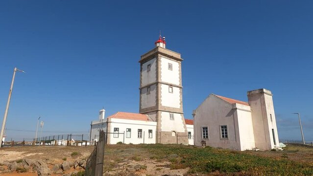 Exterior of Cabo Carvoeiro lighthouse under the blue sky in Peniche, Portugal