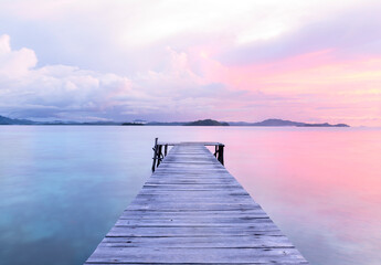 Old wooden dock at the lake, sunset shot - obrazy, fototapety, plakaty