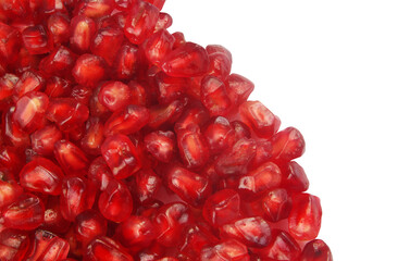 Many ripe pomegranate seeds isolated on white background with  space for text.