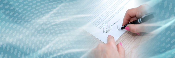 Woman signing a contract; panoramic banner
