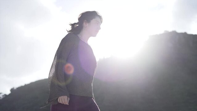 Woman Walking On A Sunny Day On The Beach Of Mount Maunganui 