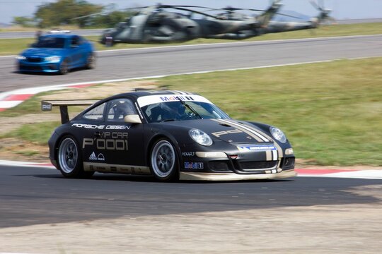 Black Racing Porsche Gt3 Car In Competition At San Carlos Circuit, Venezuela