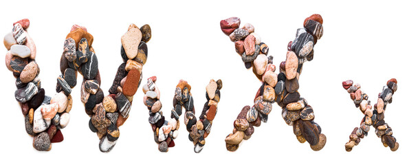 A letter of smooth stones on a white isolated background. Of the river stones lined with a letter, detailing, close-up. Selective focus
