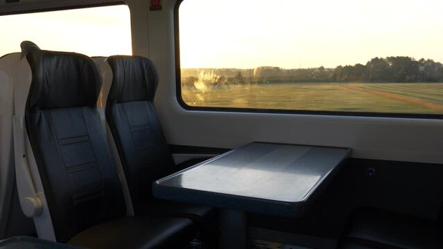 View Inside A Train With Vacant Seats Traveling In The Morning To Dublin, Ireland. - Handheld, Steady Shot