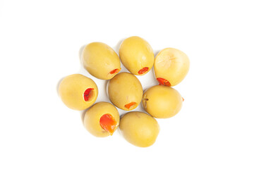 Green olives stuffed with sweet peppers top view, isolated on a white background